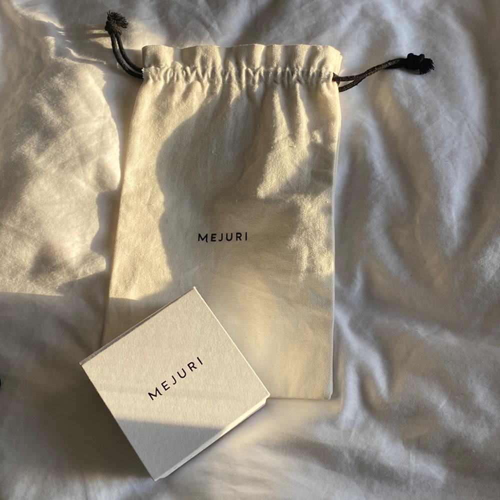 Mejuri jewelry box and cloth bag